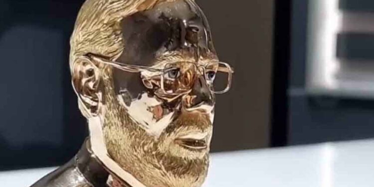 Gold statue of PM Modi